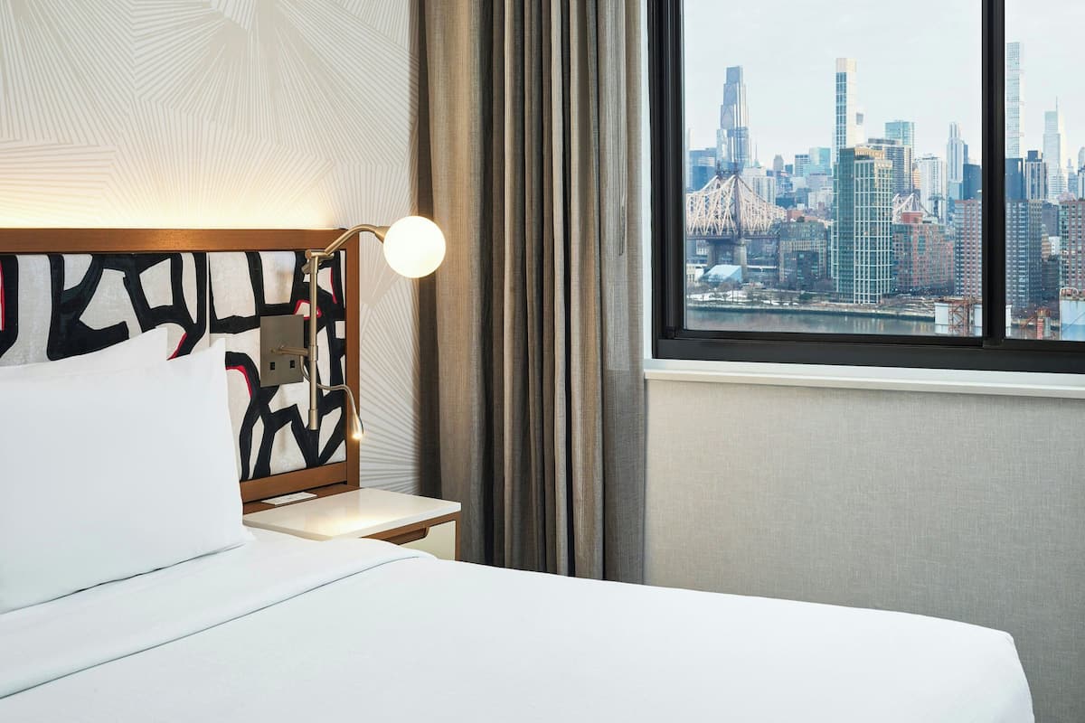 Suite, 1 King Bed, City View | In-room safe, desk, blackout drapes, iron/ironing board