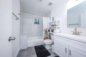 Hair dryer, towels, soap, shampoo