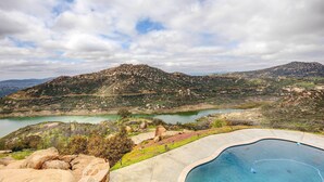 A pool with a view of mountains and a lake. - Mountaintop Ramona Home: Private Pool, Near Lake! (Ramona)