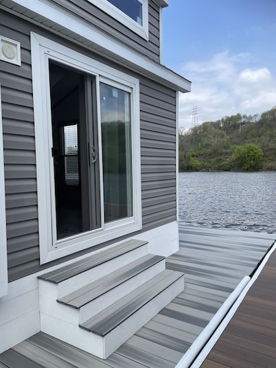 Waterfront Glamping Escape — Cozy Floating Cottages on the Peaceful Beaver River