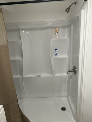 Shower, towels, soap, shampoo