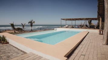 Outdoor pool, pool umbrellas, pool loungers