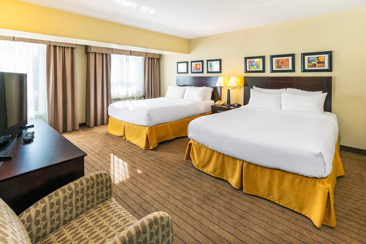 Suite, Multiple Beds, Non Smoking | Desk, laptop workspace, blackout drapes, iron/ironing board