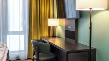 Desk, laptop workspace, free WiFi, bed sheets