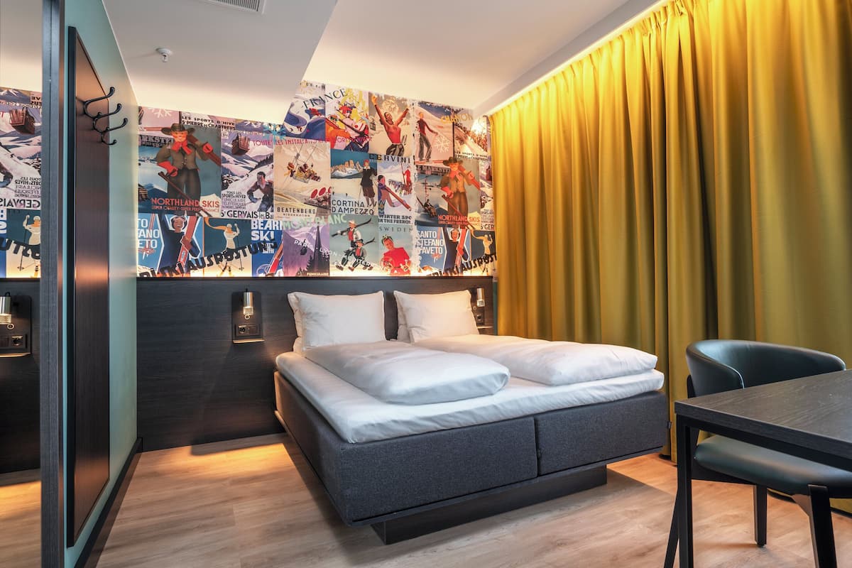 Desk, laptop workspace, free WiFi, bed sheets