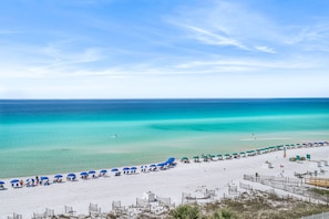 On the beach, sun loungers, beach towels
