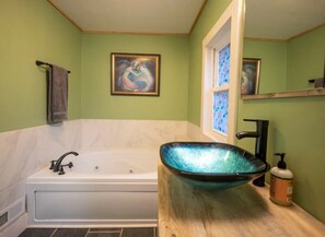 Jetted bath, hair dryer, towels, soap