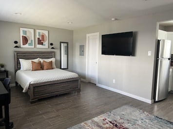 Queen size bed
58’ Roku TV.
The TV swivel watch it in bed or on the sofa