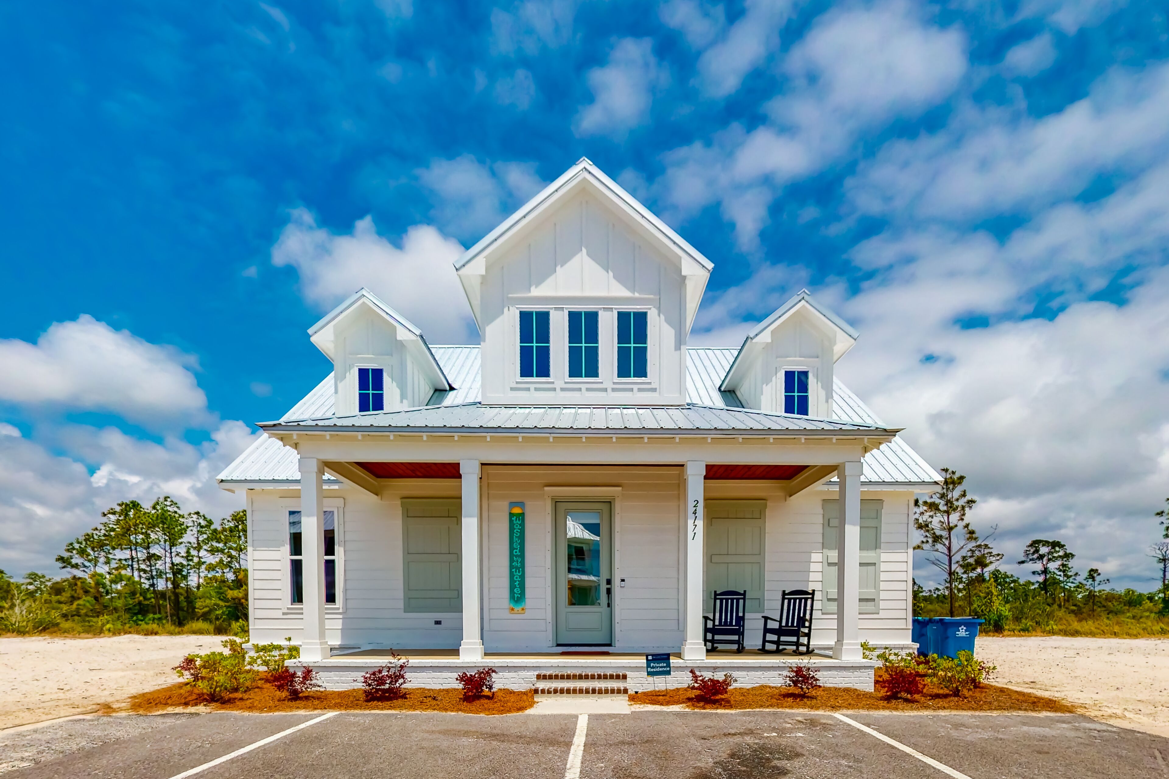 Water-view home with pool, arcade games, grill, balcony, streaming, W/D