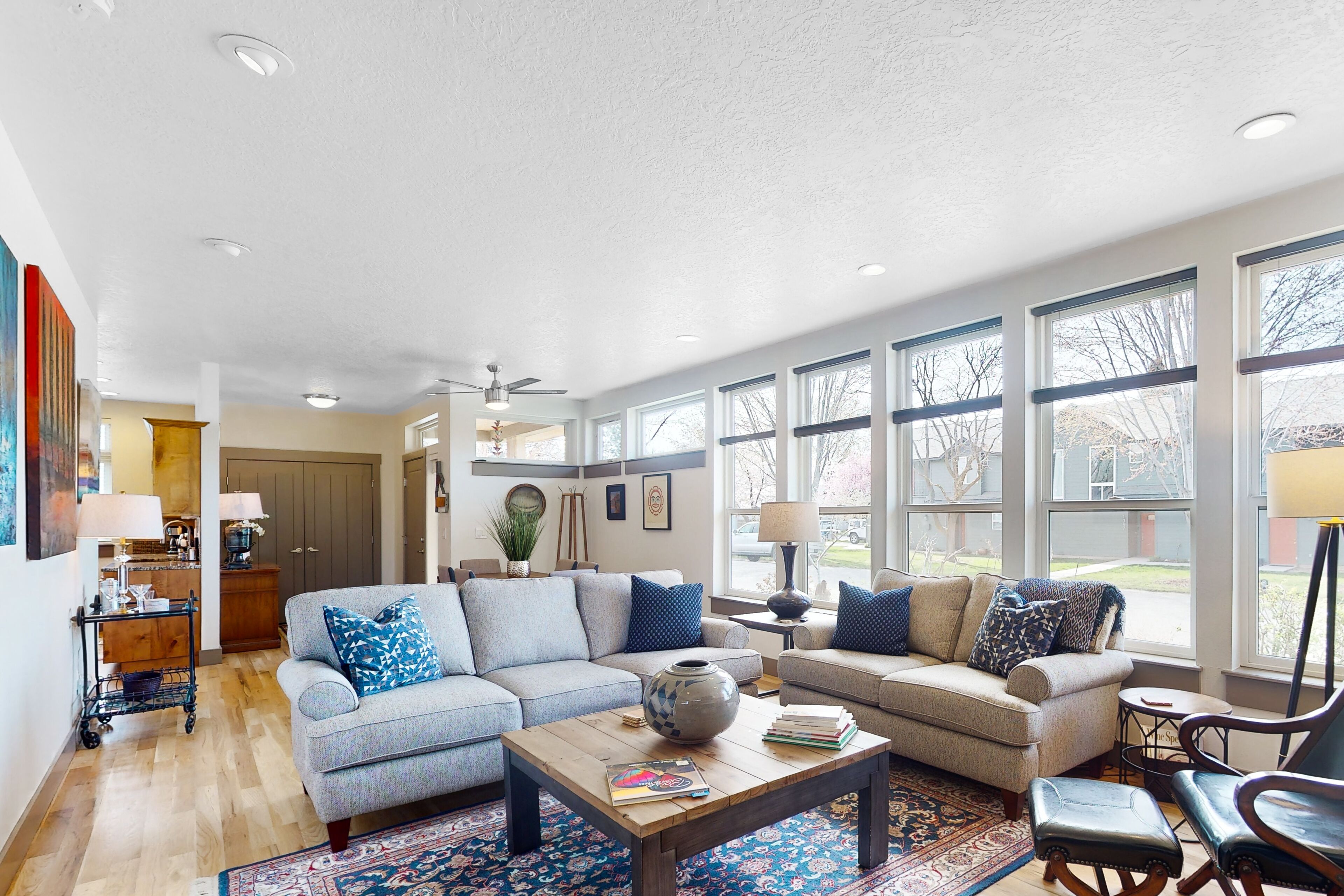 Airy home with patio, grill, fireplace, outdoor dining area, desk, & central AC