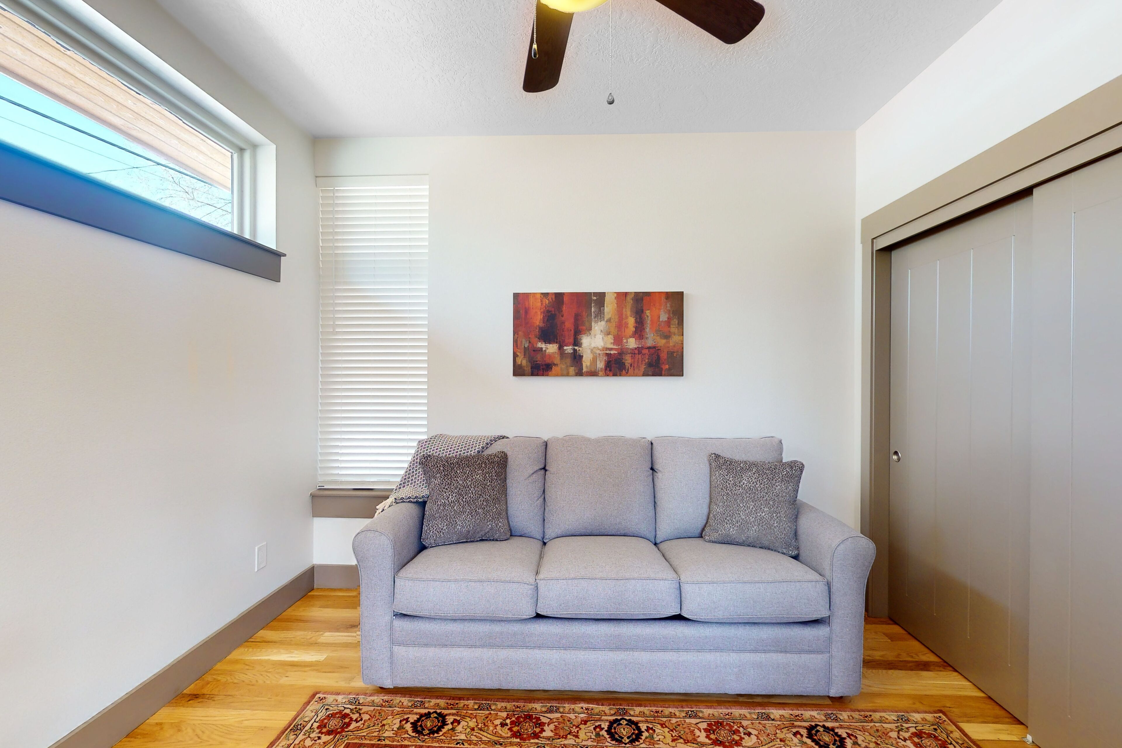 Airy home with patio, grill, fireplace, outdoor dining area, desk, & central AC