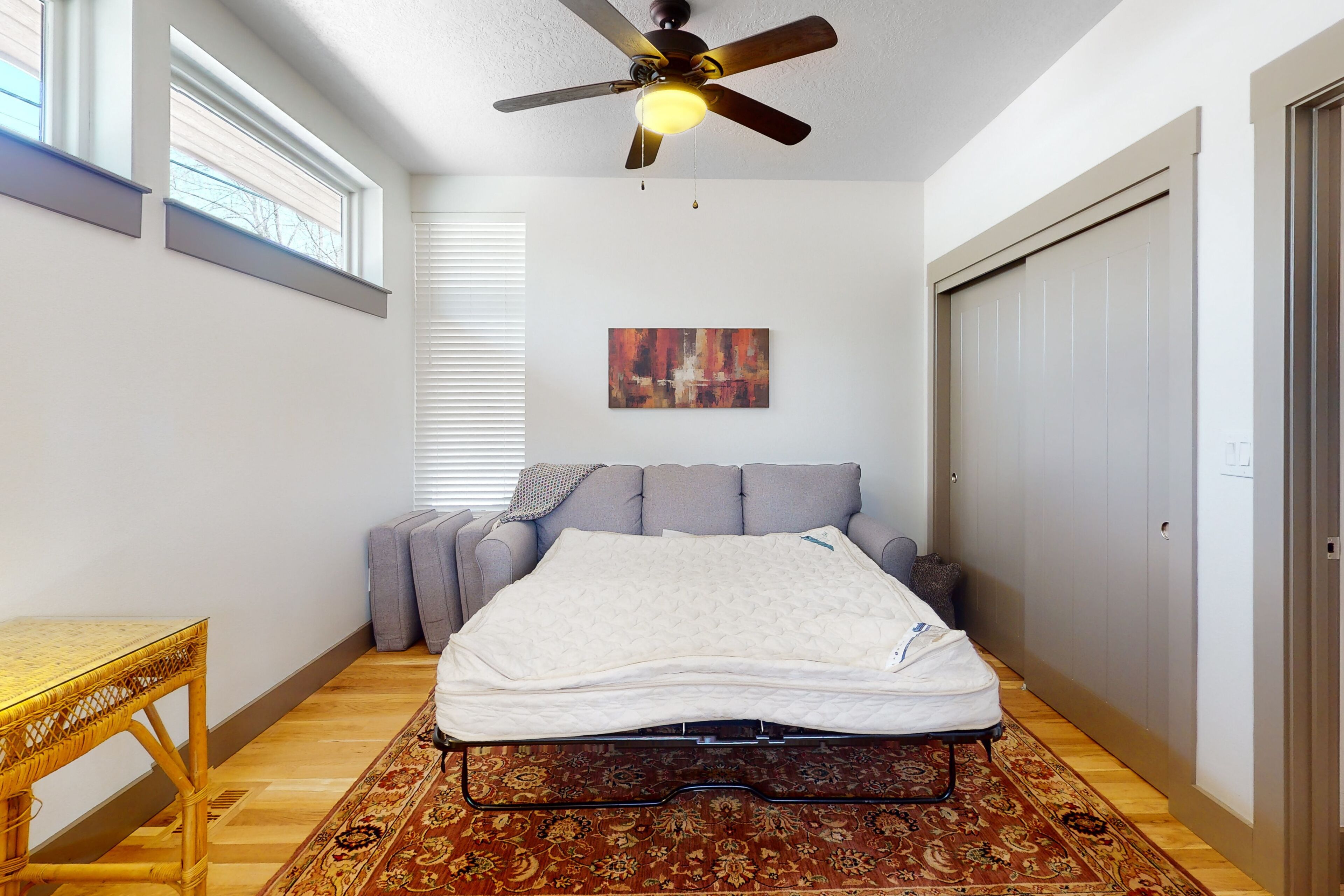 Airy home with patio, grill, fireplace, outdoor dining area, desk, & central AC