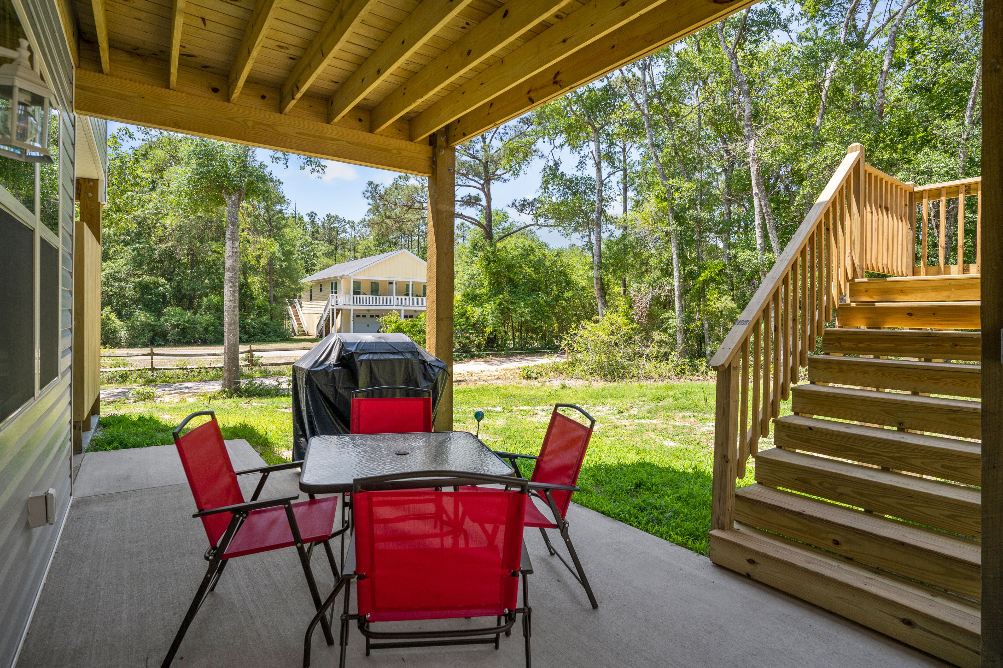 Lower-level home with patio, grill, outdoor shower, streaming, central AC