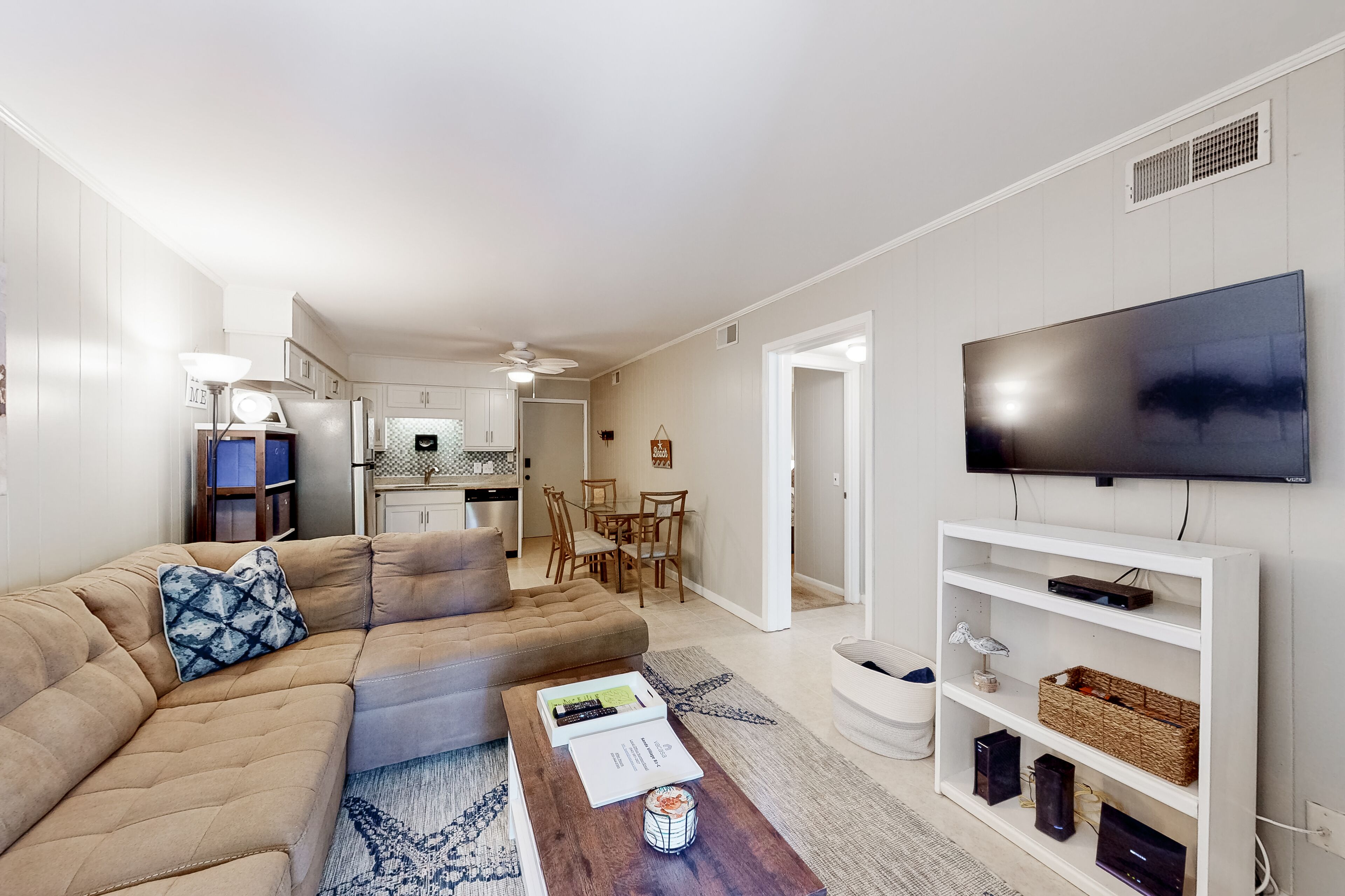 Quaint condo with pool, balcony, patio, & full kitchen - close to beach