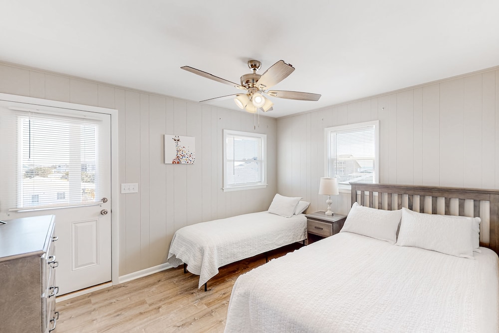 Canalfront, dogfriendly home with beach views, dock, balconies