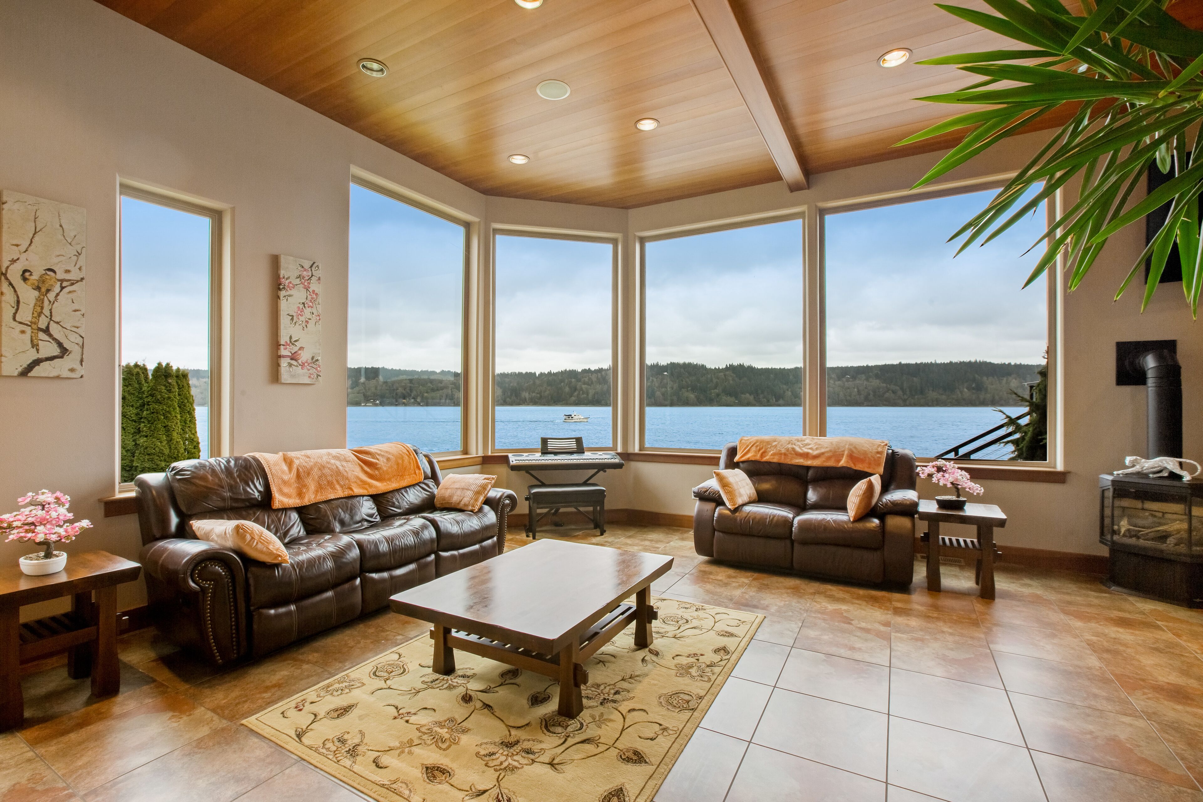 Inviting waterfront home with kayaks, dock, firepit, central AC, & W/D