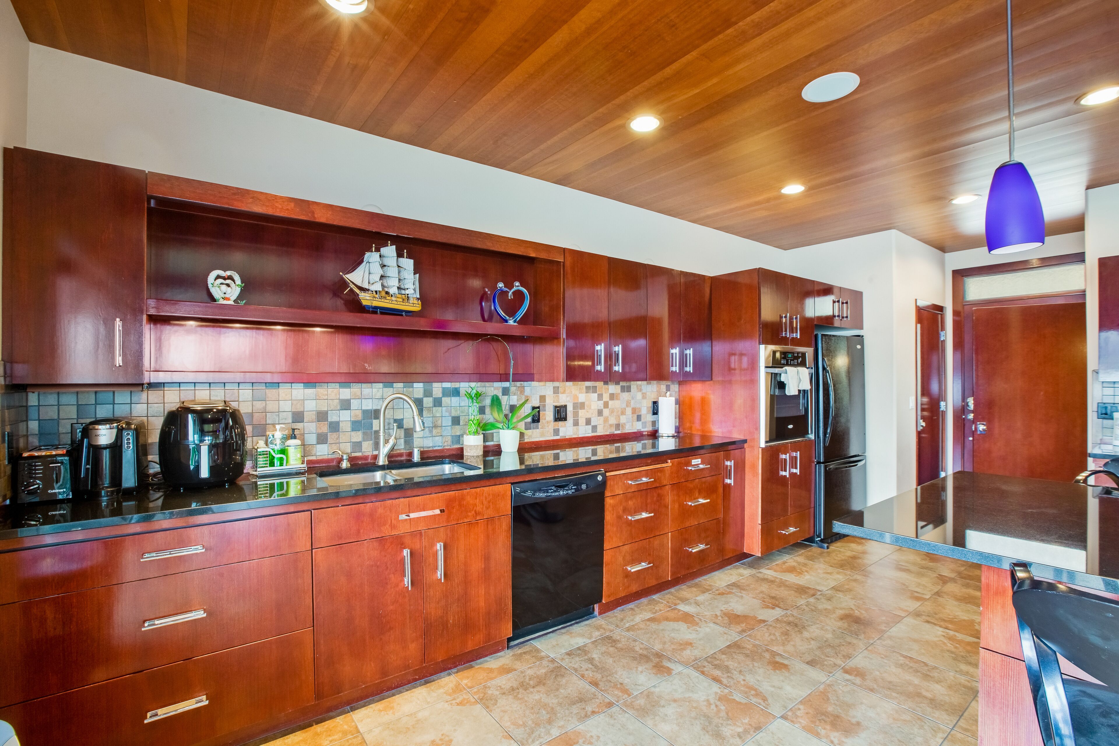 Inviting waterfront home with kayaks, dock, firepit, central AC, & W/D