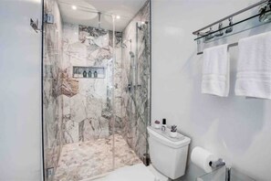 Shower, hair dryer, towels, soap
