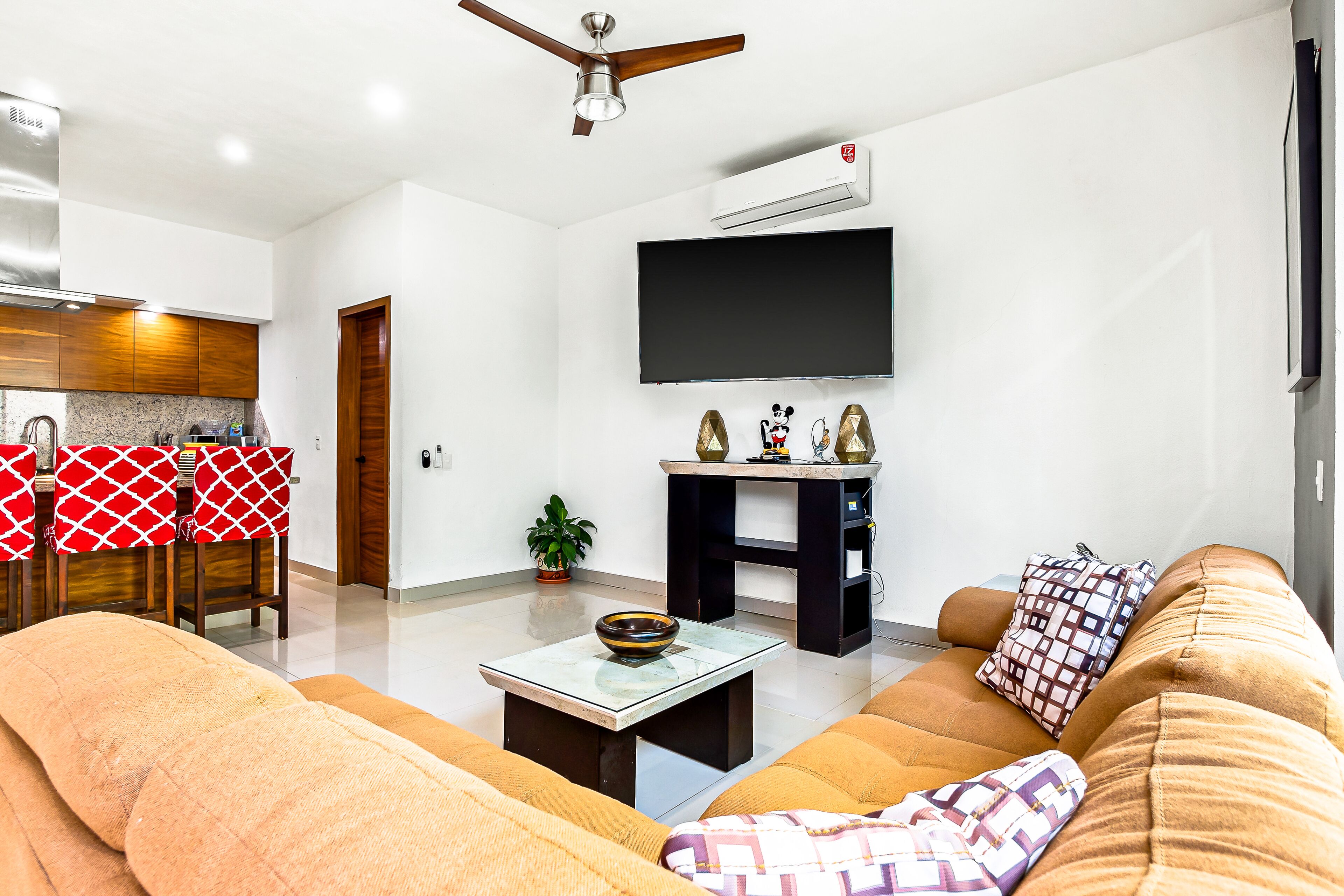 Dazzling estate with a pool, rooftop balcony, four-bedrooms, washer/dryer, & AC