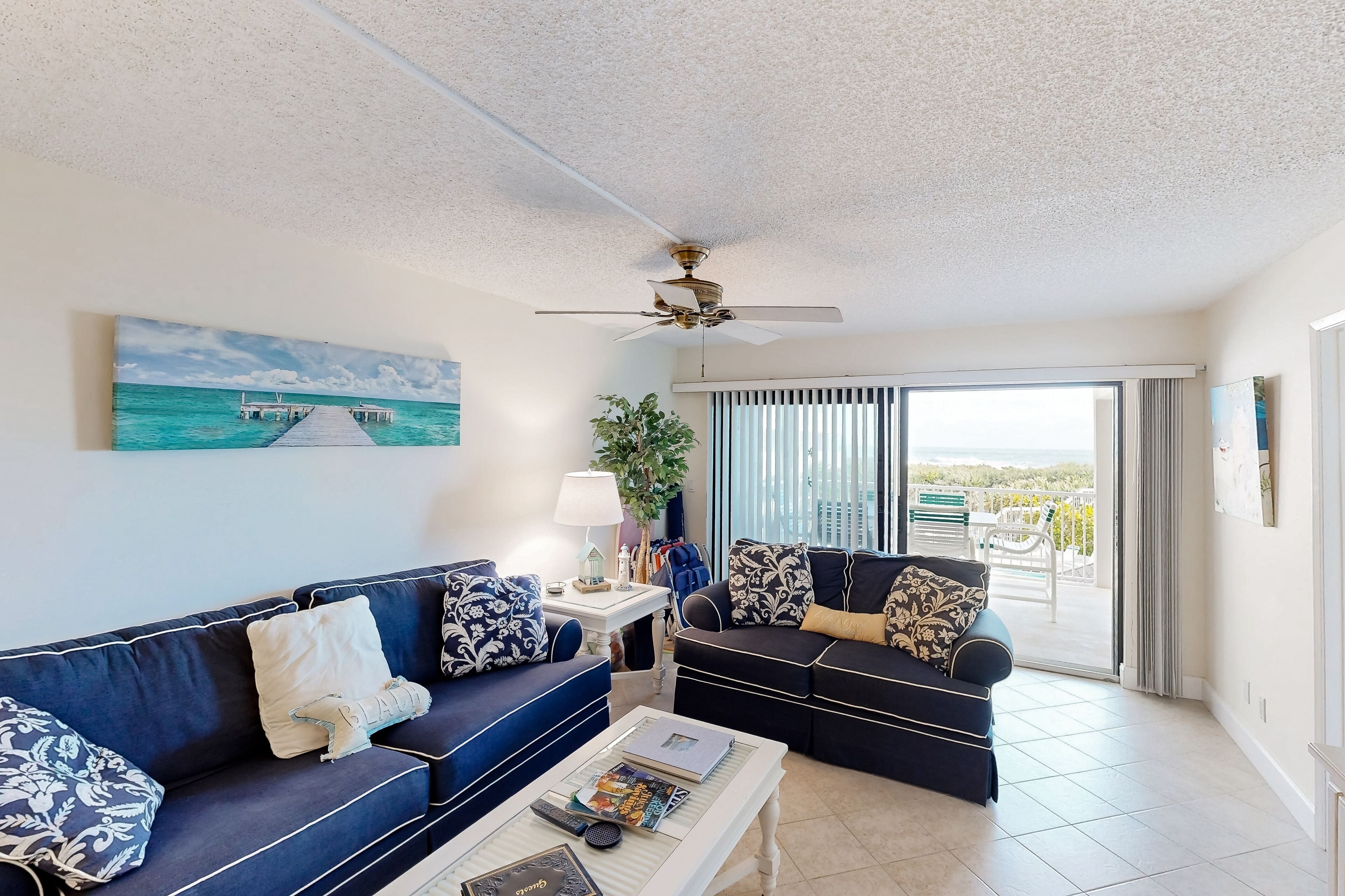 Beachfront condo with ocean views, pool, sundeck, & private balcony