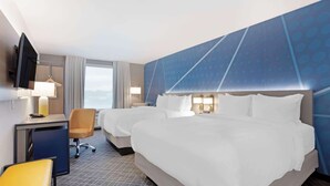 A hotel room with two beds, a desk with a chair, a TV, and a large window. - Comfort Inn & Suites Mountain Grove US-60 (Mountain Grove)