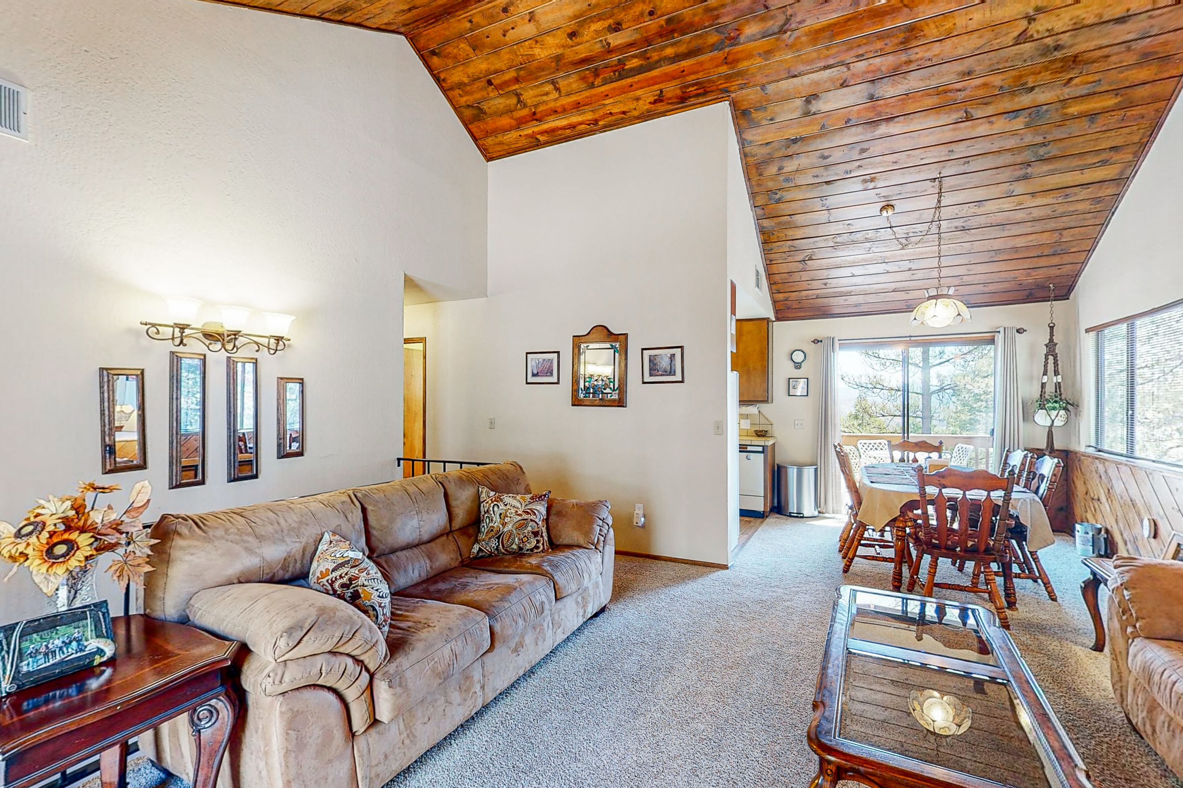 Wilderness retreat with a wood-burning fireplace, grill, deck, and washer/dryer