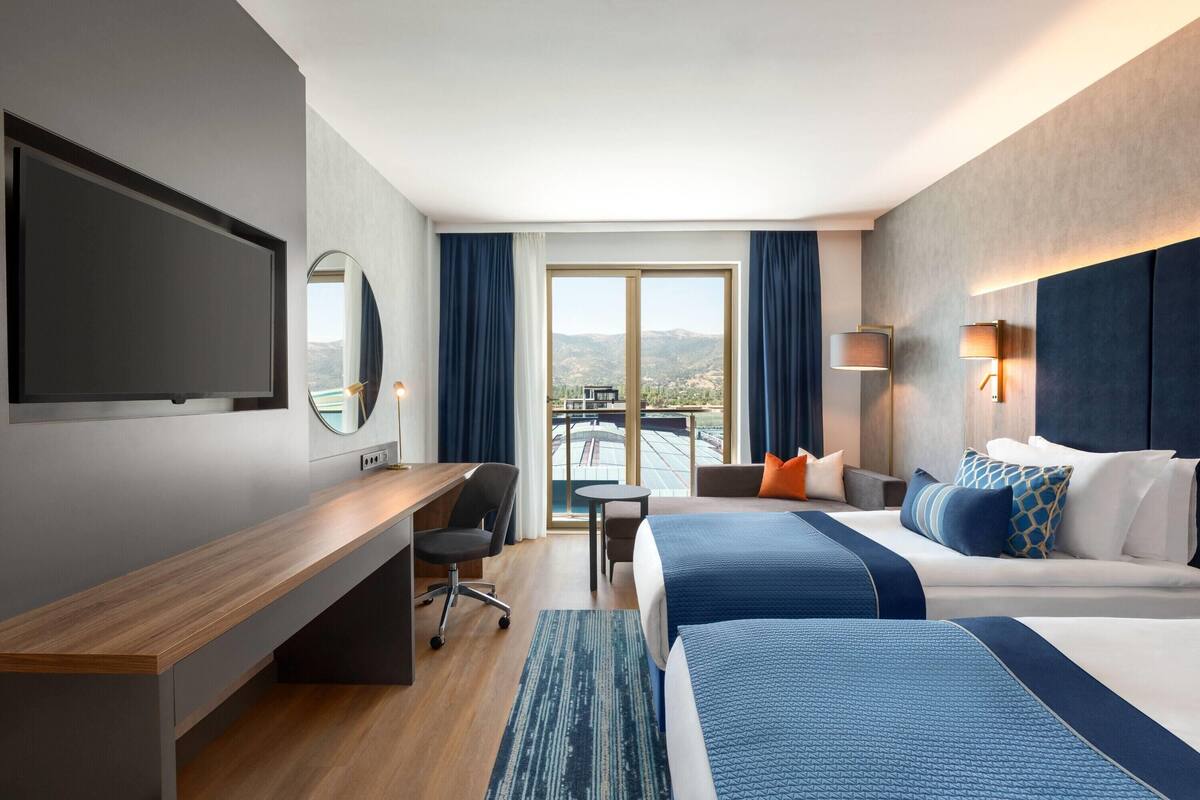 Standaard kamer | Luxe beddengoed, Tempur Pedic-bedden, een minibar, een kluis op de kamer