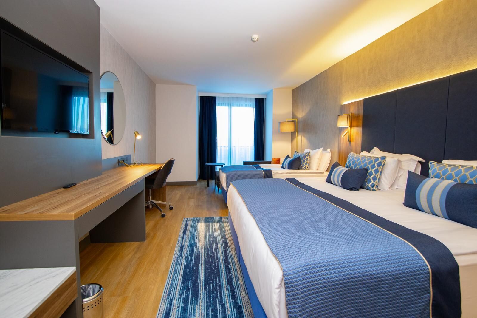 Deluxe kamer | Luxe beddengoed, Tempur Pedic-bedden, een minibar, een kluis op de kamer