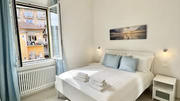 2 chambres, coffres-forts dans les chambres, fer et planche Ă  repasser