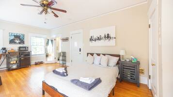 1 bedroom, desk, iron/ironing board, travel crib