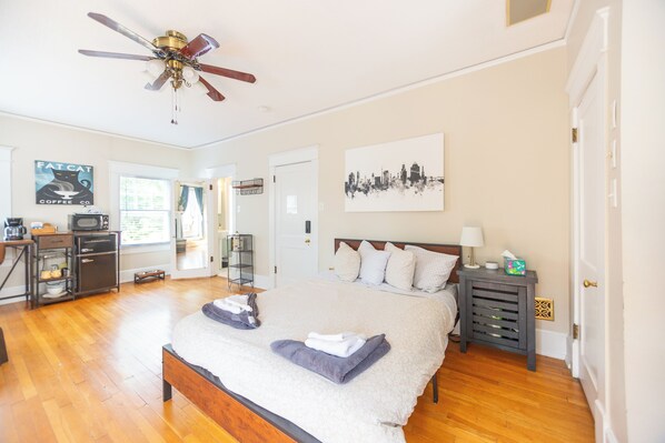 1 bedroom, desk, iron/ironing board, travel crib