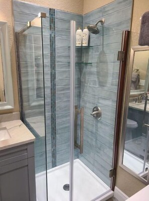 Shower, hair dryer, towels, soap