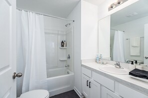 Hair dryer, towels, soap, shampoo