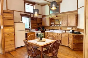 Oven, stovetop, dining tables