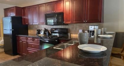 3 level Townhouse with Private Hot Tub and Garage - close to ski hill.