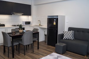 Apartamento familiar | Zona de estar | Una televisión de pantalla plana