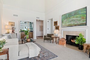 Fireplace, books - Luxury Beachfront Condo with Remarkable Ocean Views! (Santa Barbara)