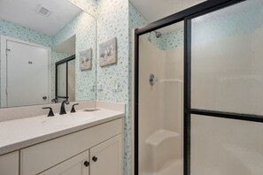 Shower, jetted tub, towels