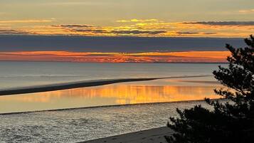 On the beach, sun loungers