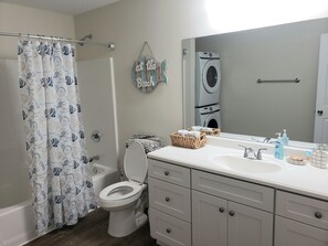 Hair dryer, towels, soap, toilet paper