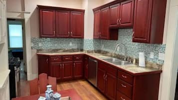Oven, paper towels, dining tables