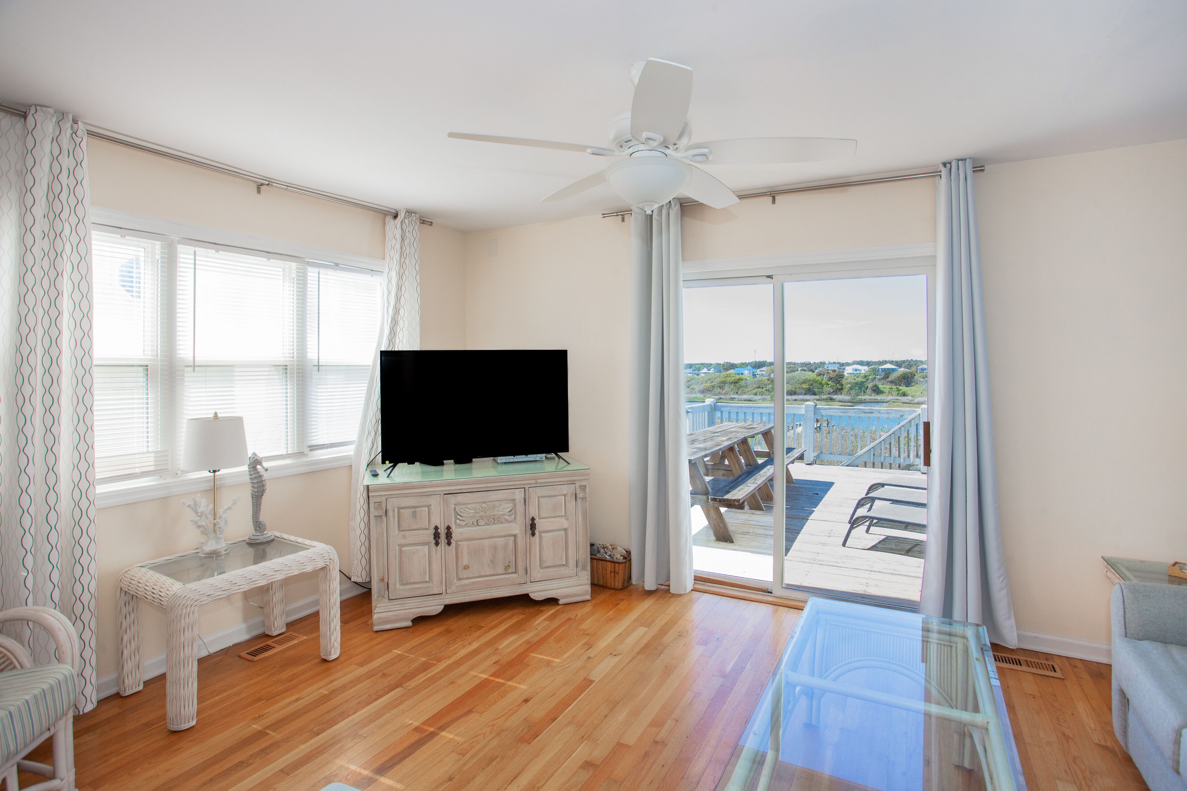 Dog-friendly townhome with water views, 3 balconies, & W/D - steps to beach