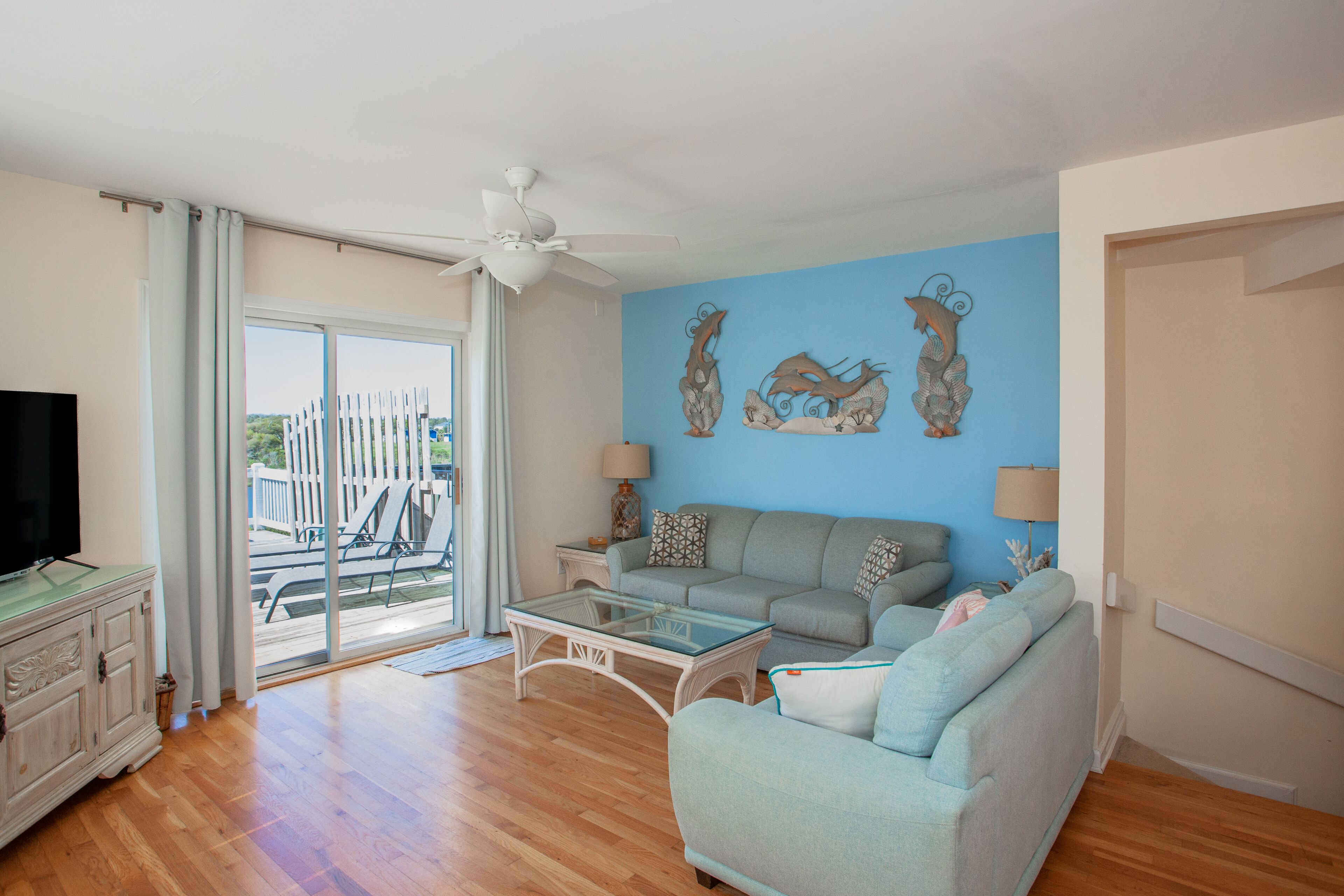 Dog-friendly townhome with water views, 3 balconies, & W/D - steps to beach