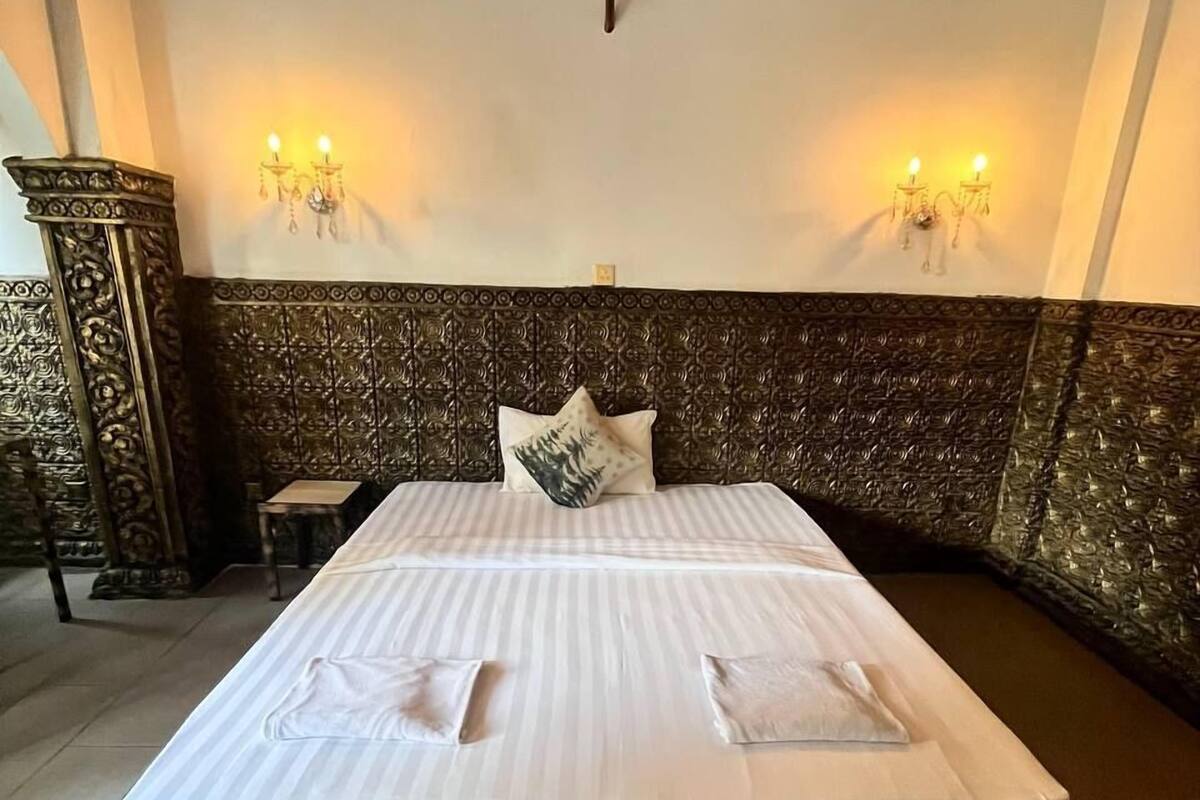 Premium bedding, desk, laptop workspace, blackout curtains