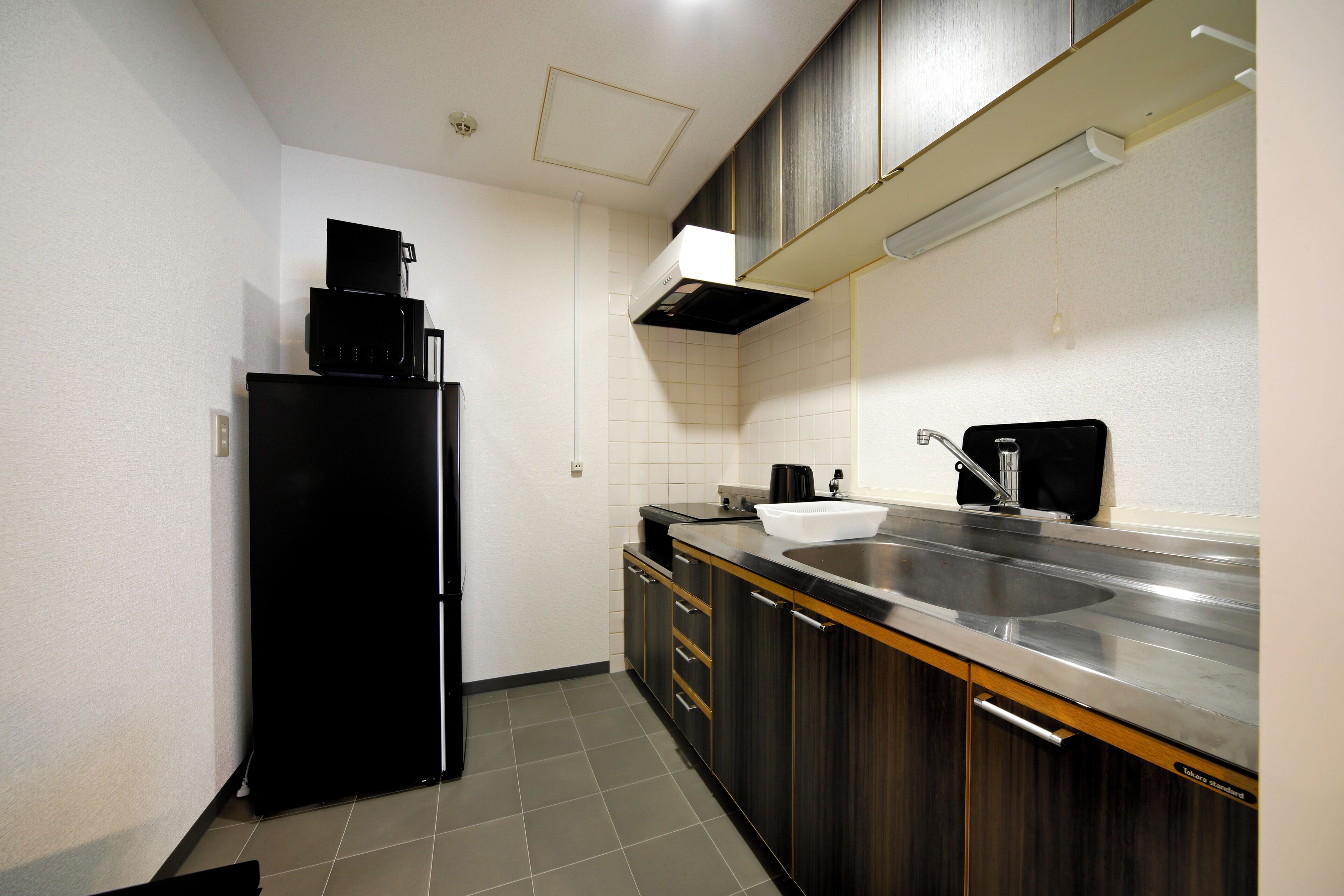 Family Suite | Private kitchen | Fridge, microwave, stovetop, toaster