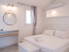 1 chambre, fer et planche à repasser, draps fournis