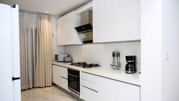 Microwave, oven, cookware/dishes/utensils