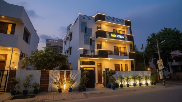 A modern hotel with a sign reading "fabHOTELS" and a number "A750" on the facade. - FabHotel The Maple Stays - Nr. Leisure Valley Park, Iffco Chowk (Gurugram)