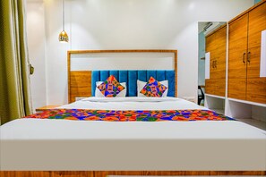 Habitación Deluxe | Sábanas de algodón egipcio y ropa de cama de alta calidad 