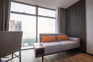 Down comforters, free minibar, in-room safe, desk